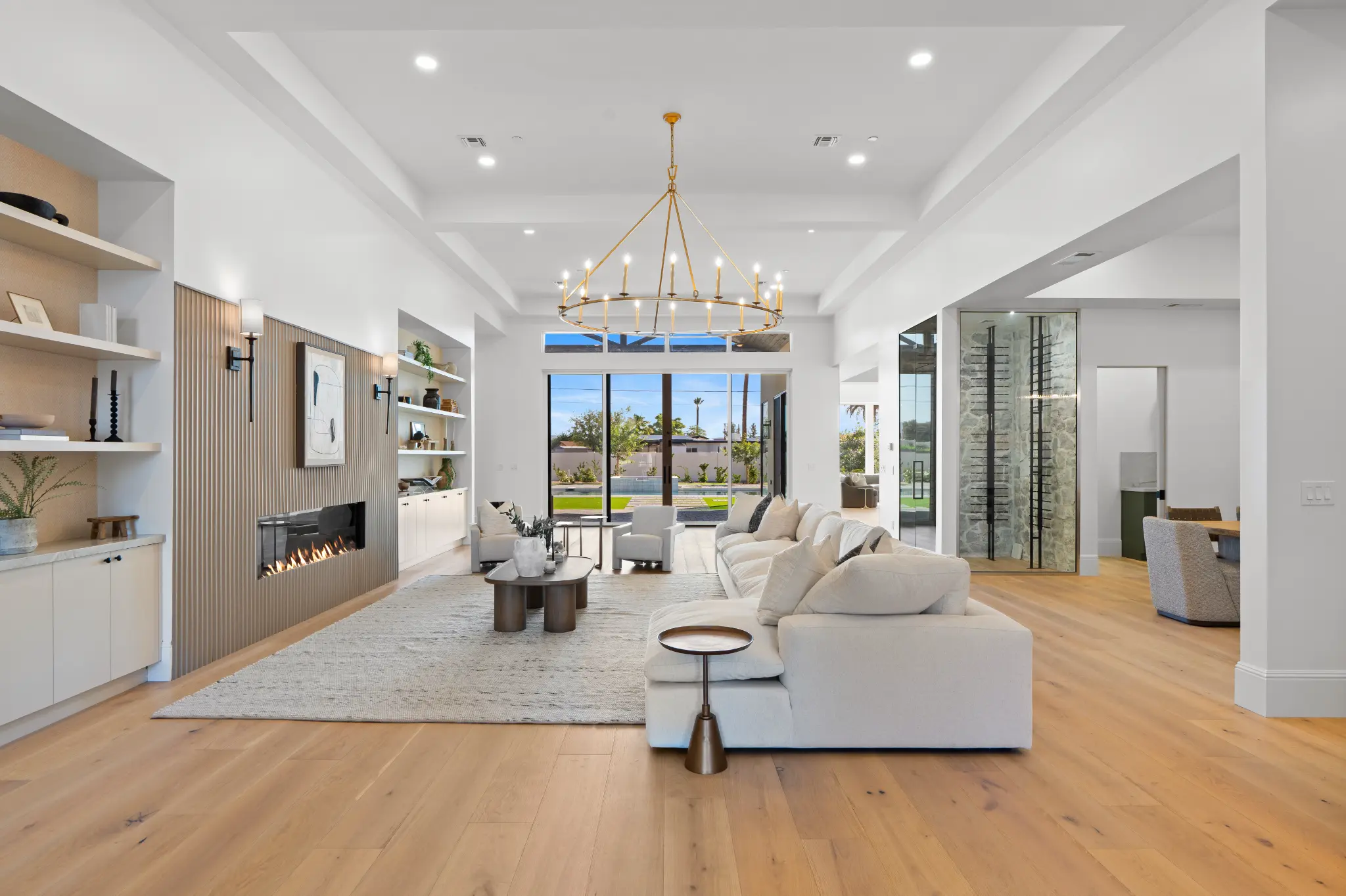 Great room with fireplace and wine room